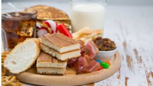 Pile of candies, cakes and sugary drinks – excess sugar linked to poor gut microbiome