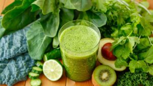 Green gut cleanser smoothie made with spinach, ginger, and chia seeds, a refreshing detox drink that supports digestion and gut health.