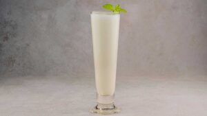 Glass of kefir, a fermented milk drink with probiotics for digestion and healthy gut microbiome.