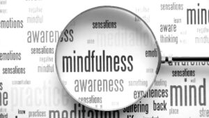 mindfulness reduces stress and improve gut health through the gut-brain connection.