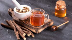 Licorice root tea in a cup, a natural gut-healing herbal tea that soothes the digestive tract and supports healthy digestion.