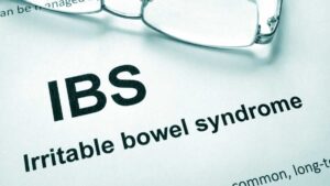 Irritable Bowel Syndrome (IBS) symptoms like bloating, cramps, and abdominal pain caused by stress and poor gut health.