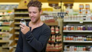 a person selecting the best prebitic fiber supplement for improving gut health and digestion.