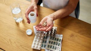 Illustration of different probiotic supplement bottles with a checkmark symbol, representing Best Probiotic Supplement for Beginners.
