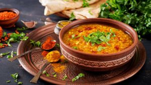 Anti-inflammatory turmeric coconut curry with lentils for gut health.